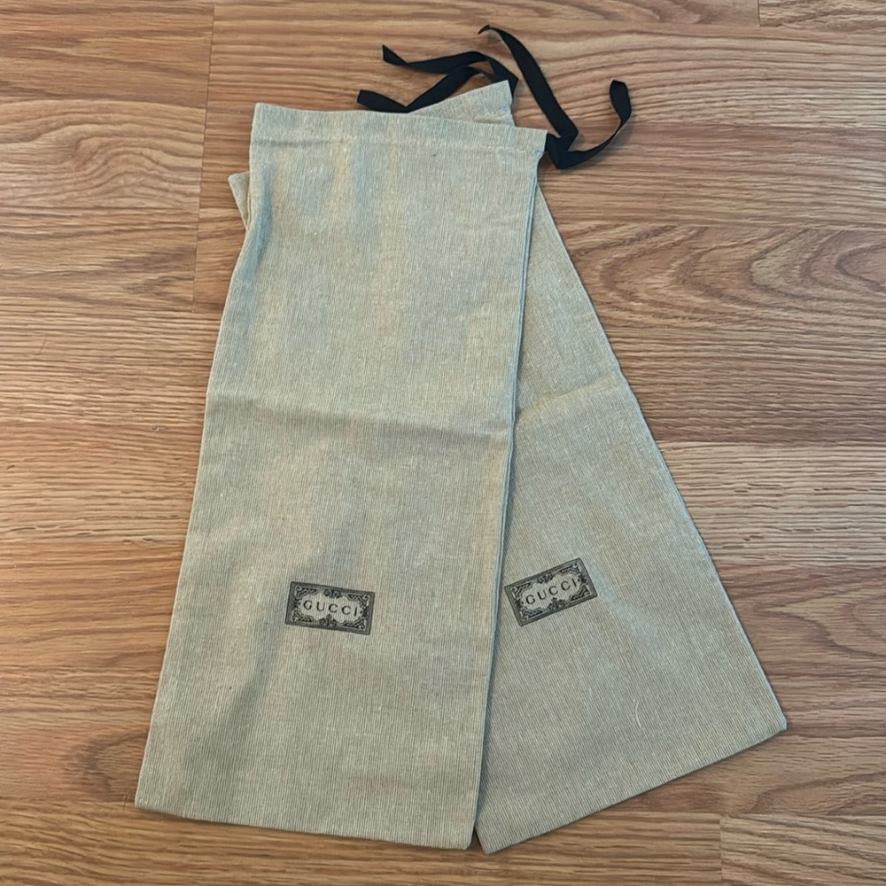 Narrow Gucci dust bags